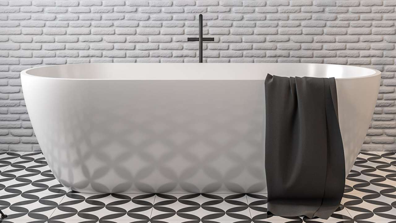 Ein­fa­mi­li­en­haus mit integriertem Carport